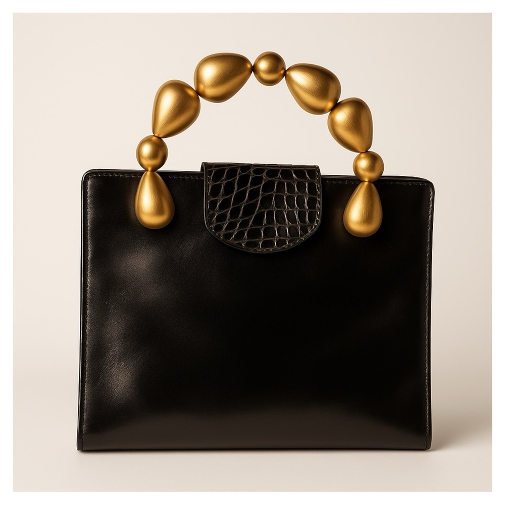 Elegant Black Handbag with Gold Accents